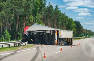 A truck over turned on the road
