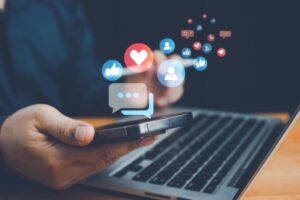 Man using social media on mobile phone