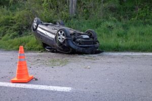 A roll over car on the road after accident